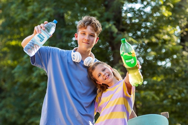 Models posing with bottle mockup