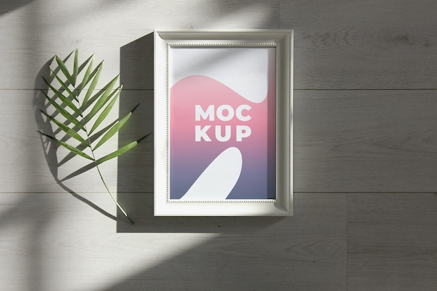 PSD modern frame hanging on wall mockup