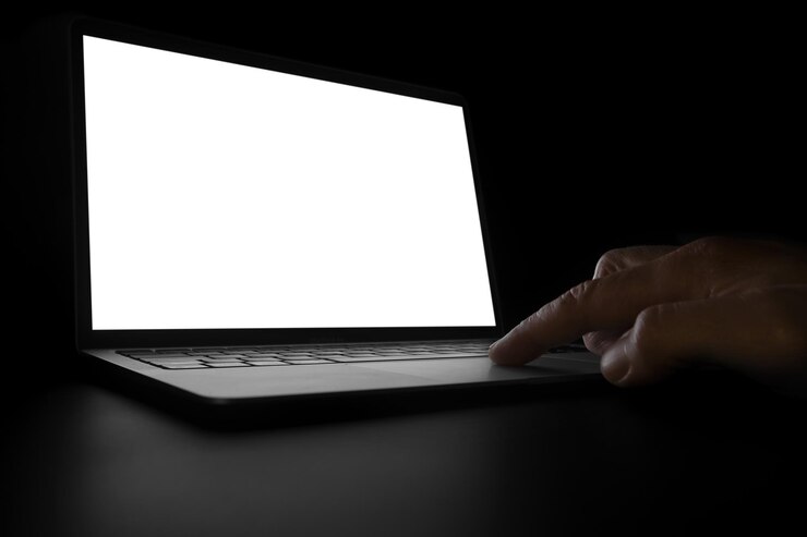 PSD modern laptop computer on the tabl on the black background