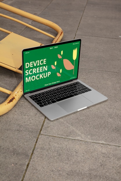 Modern open laptop mock-up on the floor