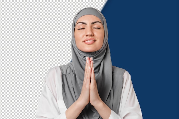 PSD modląc się, mając nadzieję, młoda arabska muzułmańska kobieta z bliskiego wschodu w szarym hidżabie pyta