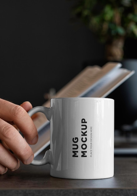 PSD a mug mockup on office table