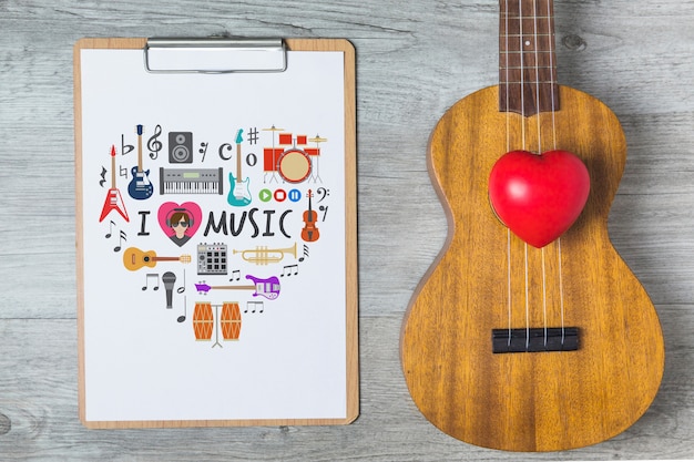 PSD mockup di musica con chitarra e appunti