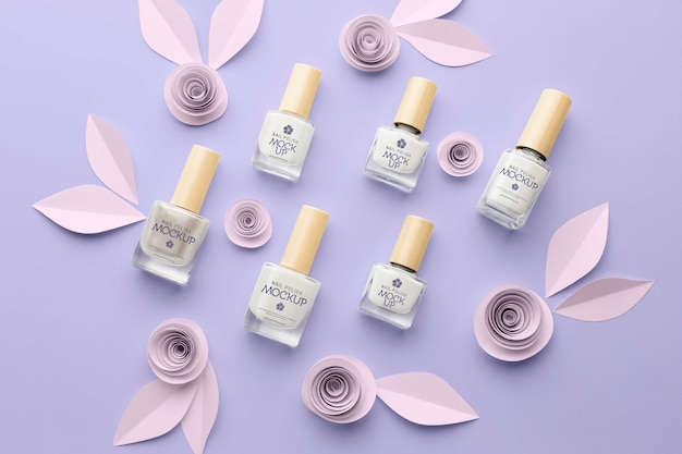 PSD nail polish bottle design mock-up with paper flowers