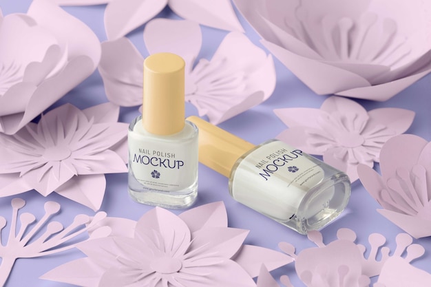 PSD nail polish bottle design mock-up with paper flowers