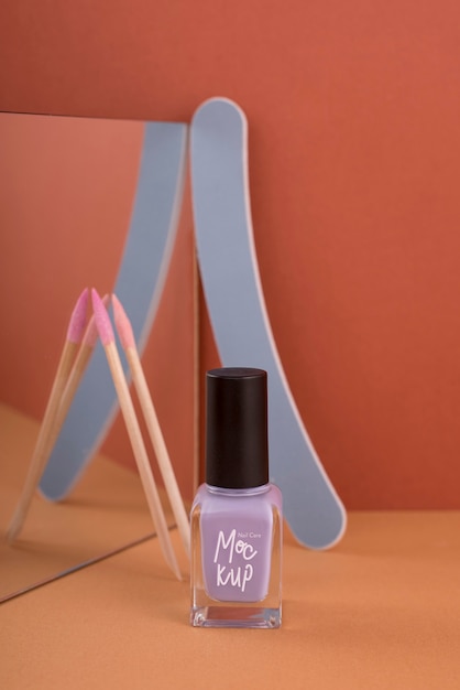 PSD nail polish bottle mock-up with manicure essentials