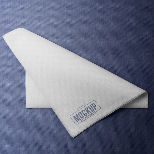 PSD napkin on blue background top view