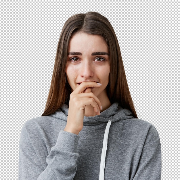 Negative emotions Portrait of young charming pretty caucasian girl with brown long hair in fashionable casual hoodie crying clothing mouth with hand feeling depressed and crushed