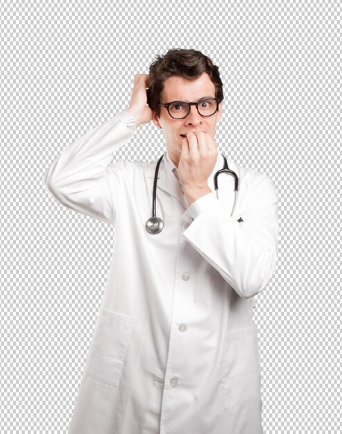 Nervous doctor against white background