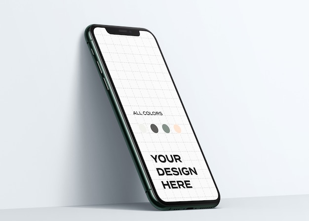 PSD nuovo smartphone mockup appoggiato al muro