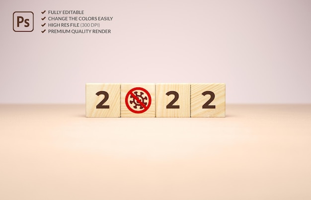 New year 2022 and the end of covid 19 pandemic concept in wooden cubes on a minimal background