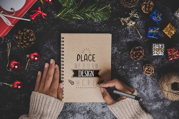 PSD notebook mockup with christmas decoration