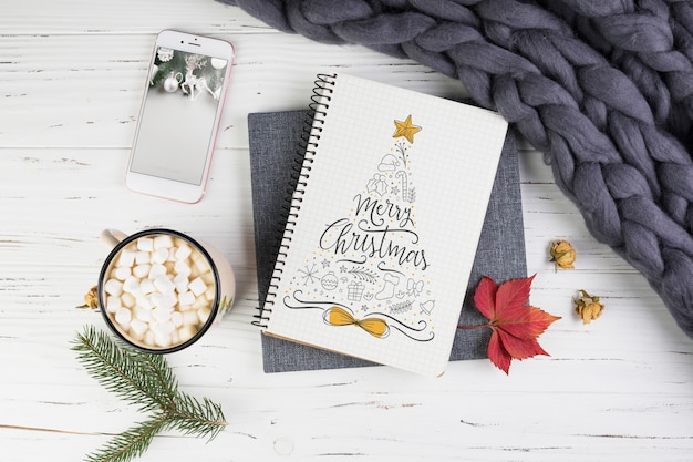 Notebook mockup with christmas decoration