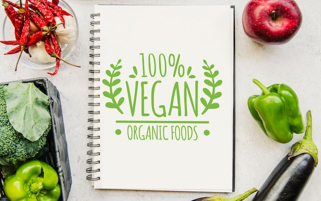 PSD notebook mockup with vegan food