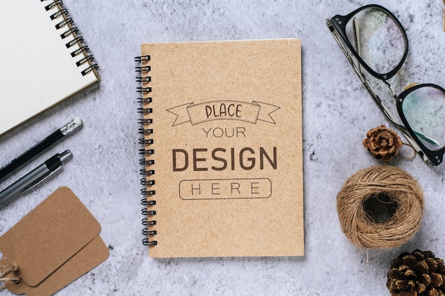 Notebook with work space psd mockup