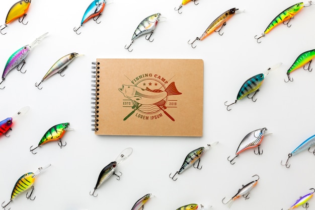 PSD notepad mock-up surrounded by fish bait