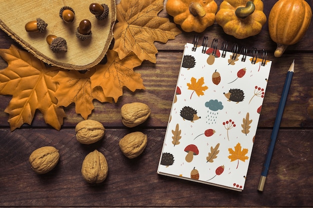 PSD notepad mockup with autumn concept