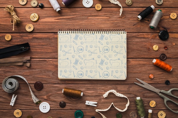 Notepad mockup with sewing concept