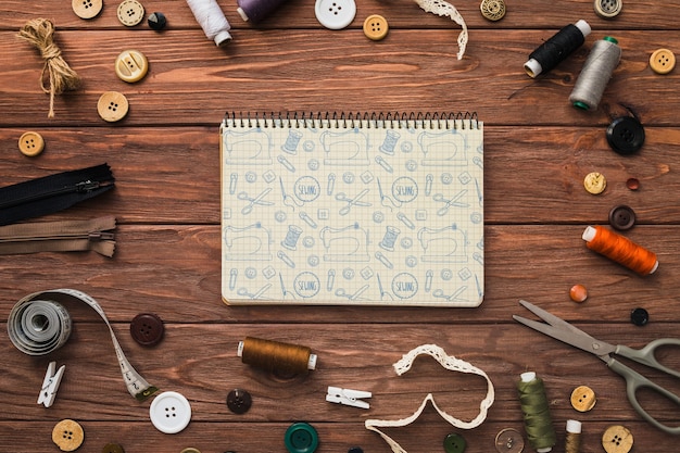 Notepad mockup with sewing concept