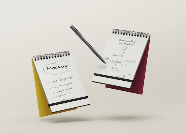 PSD mockup di quaderni con una penna