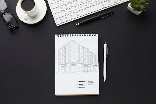 office desk with keyboard, coffee and notebook mock-up