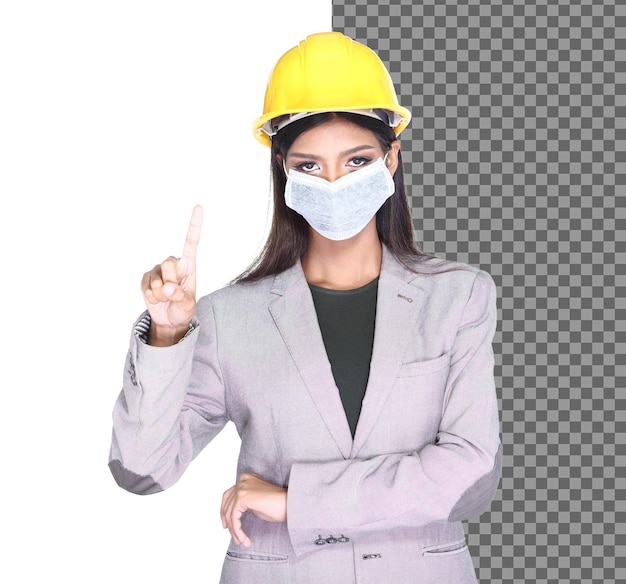 Office woman gray suit wear yellow safety hard hat wearing industrial dust mask, show touch screen finger sign, client architect female wear protective face mask from covid-19, studio isolated