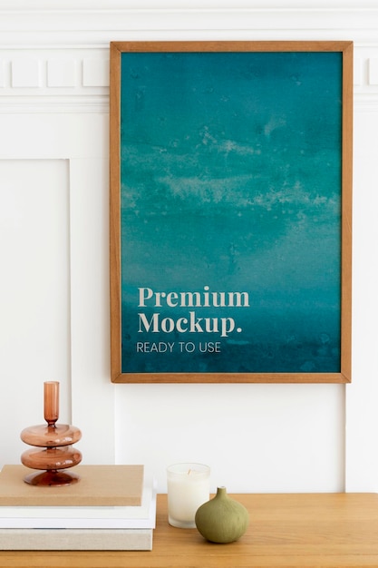 Ombre picture frame psd mockup over a wooden sideboard table 