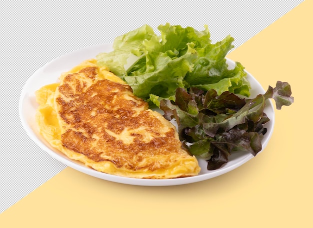 omelet on round white plate with green lettuce mix leaves isolated on white background angle view