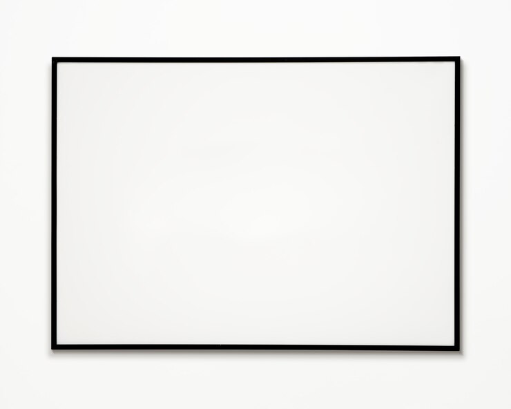 PSD one photo frame isolated on white wall