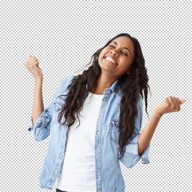 Opname van een donkere succesvolle vrouw met lang golvend haar in een denimhemd die haar vuisten met opwinding knijpt en gelukkig is om haar prestatie en succes te vieren