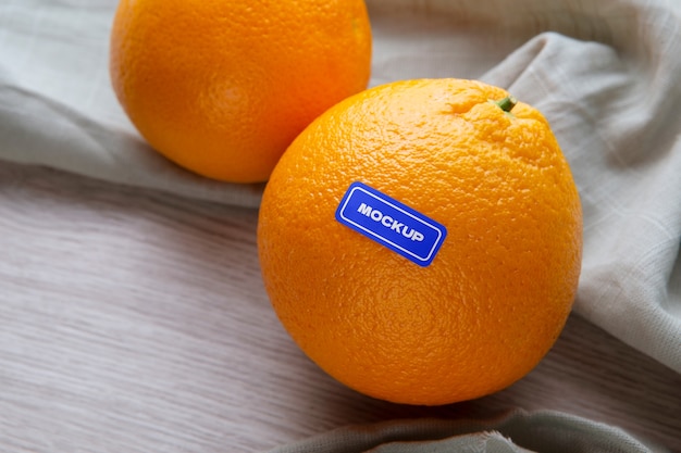 PSD oranges arrangement with sticker mockup