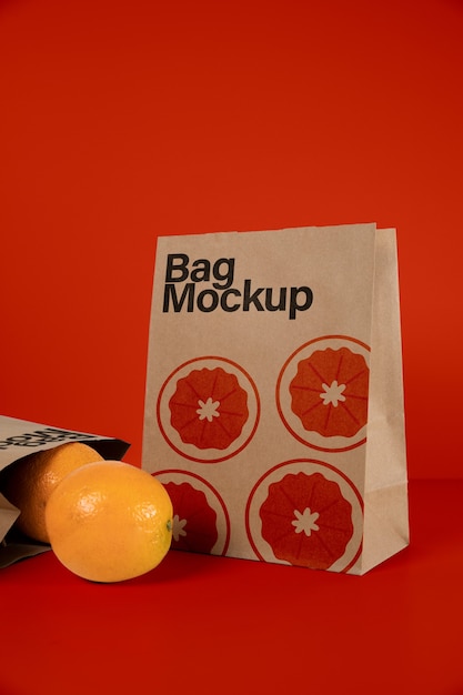 Oranges with paper bag mock-up