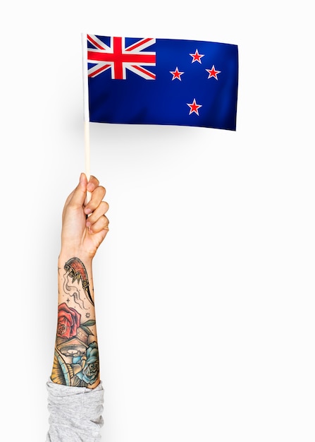 PSD osoba machająca flagą nowej zelandii