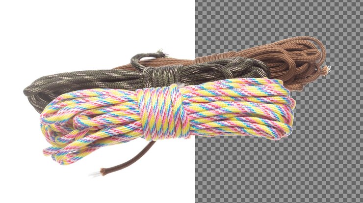 PSD pack group climbing rope roll fly in air strong safety climbing rope for sport mountain hobby need safety gear to lock hold weight of climber rope white background isolated