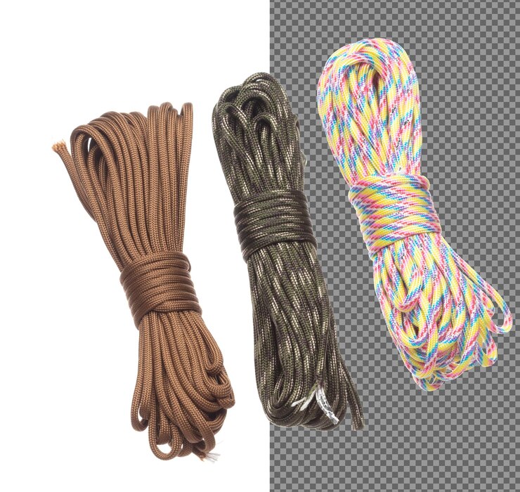 PSD pack group climbing rope roll fly in air strong safety climbing rope for sport mountain hobby need safety gear to lock hold weight of climber rope white background isolated
