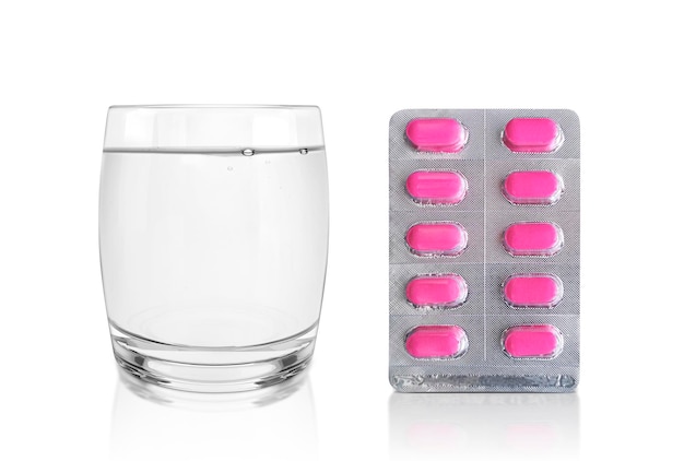 PSD package of pills and a glass of water pharmacy and medicine concept transparent background