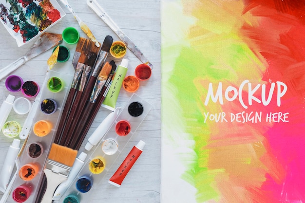 PSD painting watercolors and brushes with mock-up