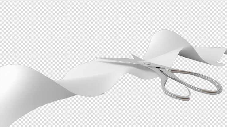 PSD a pair of scissors cutting paper on a white background for crafting office use and diy projects