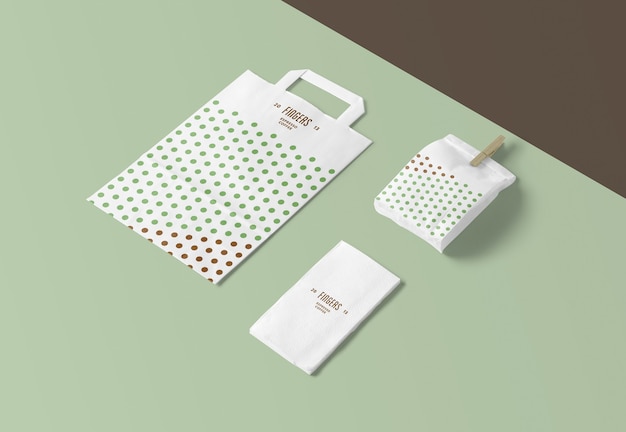 PSD paper bag and napkin mockups isolated