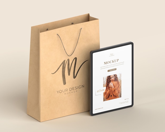 PSD paper bag and tablet arrangement mockup