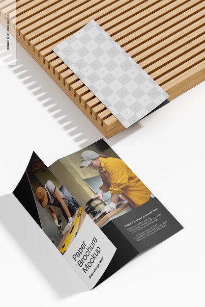 PSD paper brochures with wooden panel mockup high angle view