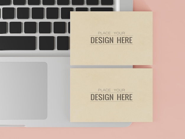 PSD paper business card  mockup on laptop