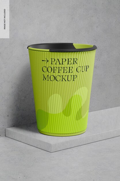 PSD tazza di caffè di carta su calcestruzzo mockup, vista laterale