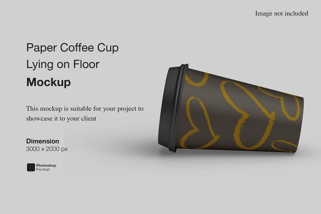 Paper coffee cup lying on floor mockup