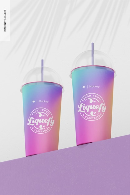 Paper cups with plastic dome lid mockup low angle view