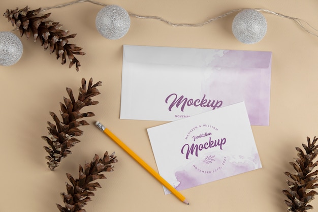 PSD paper invitation mock-up with watercolor design and pine cones