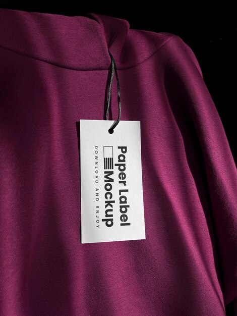 Paper Label Mockup on a Burgundy Garment