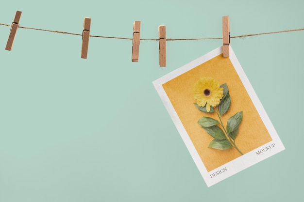 PSD paper mockup on clothesline