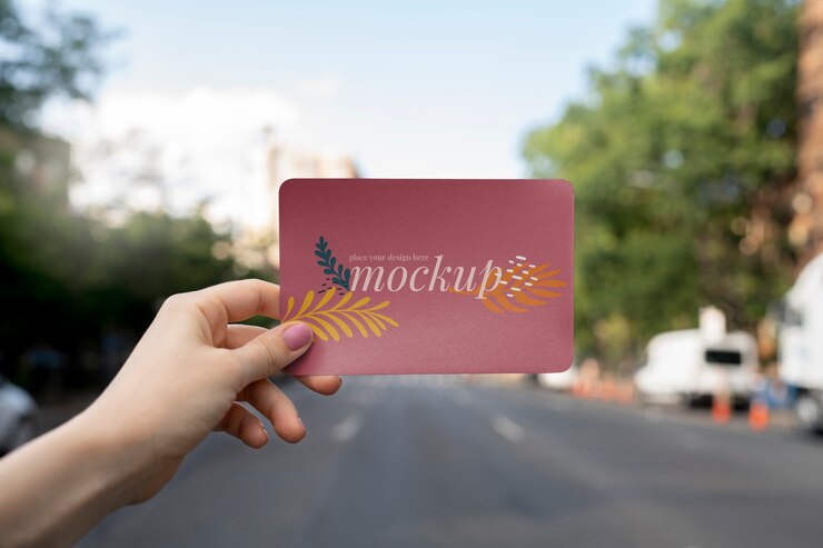 Premium PSD | Paper mockup design held in hand