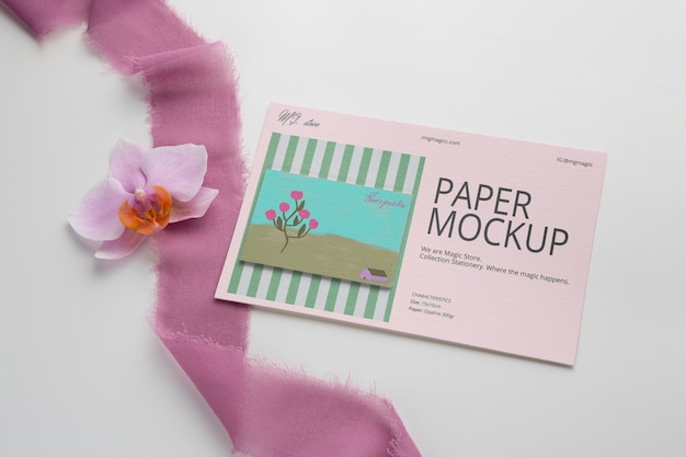 Paper mockup near orchid